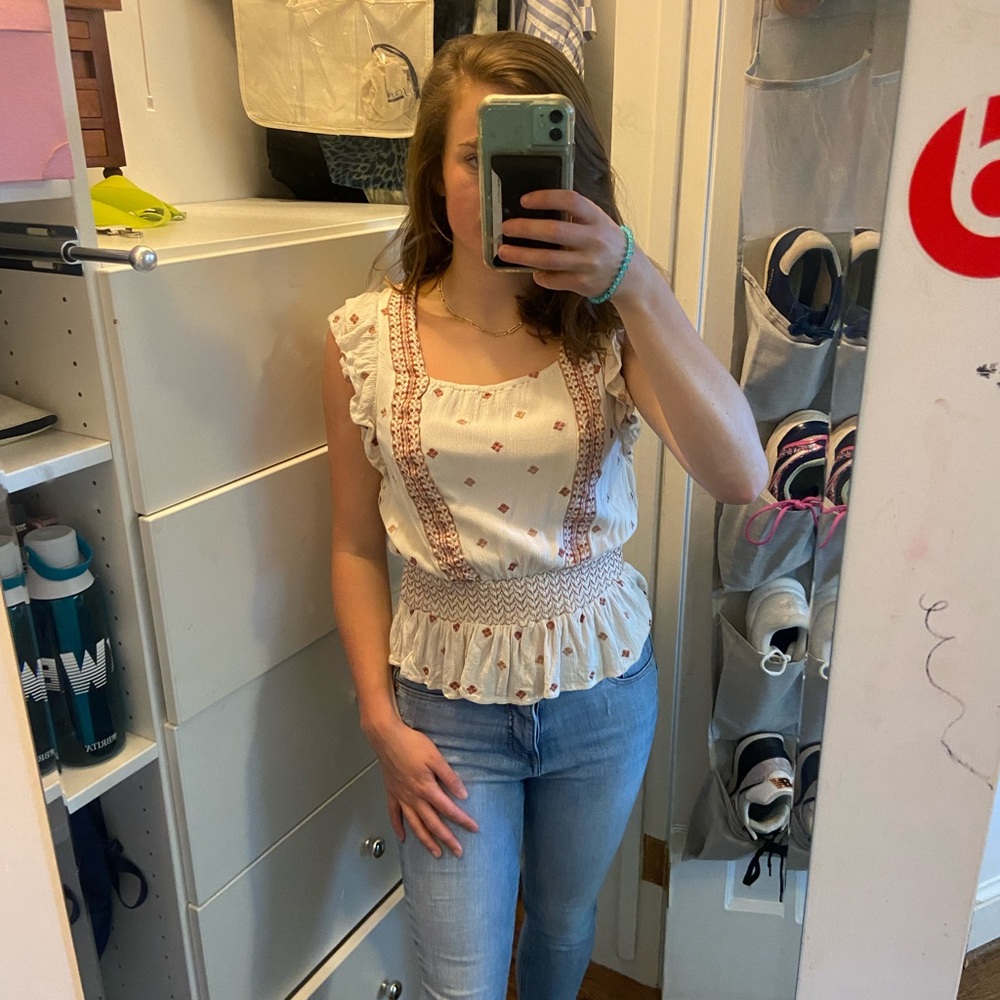 In bloom, White and Red shir, size small